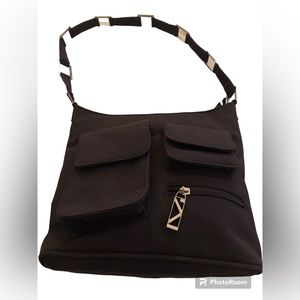 Brown Handbag with Metal Accents.